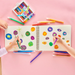 Two children coloring with OOLY Switch-Eroo color changing markers