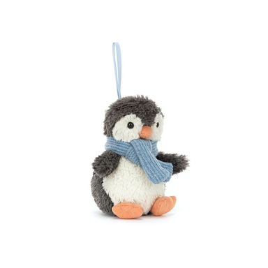 a plush penguin holiday ornament with a blue scarf set against a white background. 