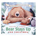 Cover of Bear Stays Up for Christmas by Karma Wilson and Jane Chapman, showing a big brown bear lying in the snow surrounded by a hare, badger and other woodland friends