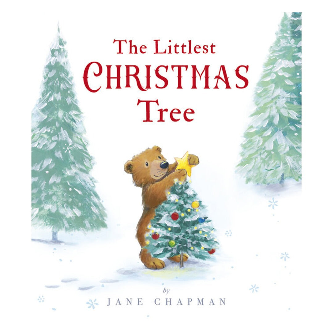 Cover of The Littlest Christmas Tree by Jane Chapman, showing a bear cub placing a gold star on top of a small decorated tree in a snowy forest