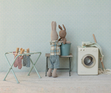 Micro Rabbit in Blue Knitted Suit — lifestyle scene; other toys and accessories sold separately
